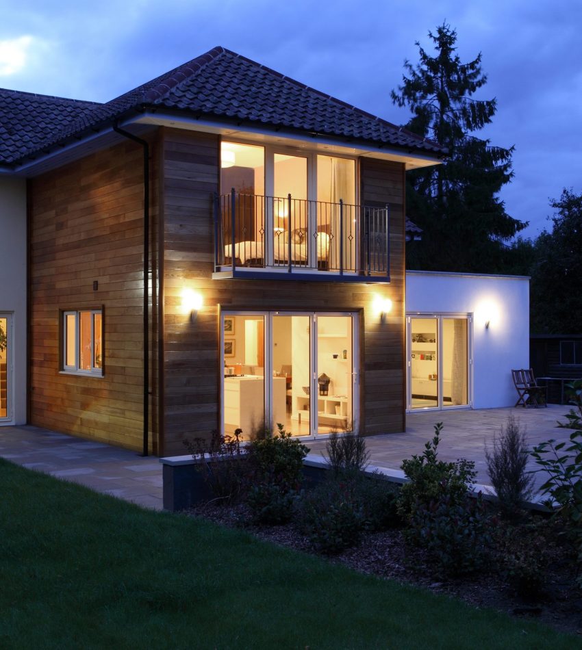 Large house illuminated in the evening